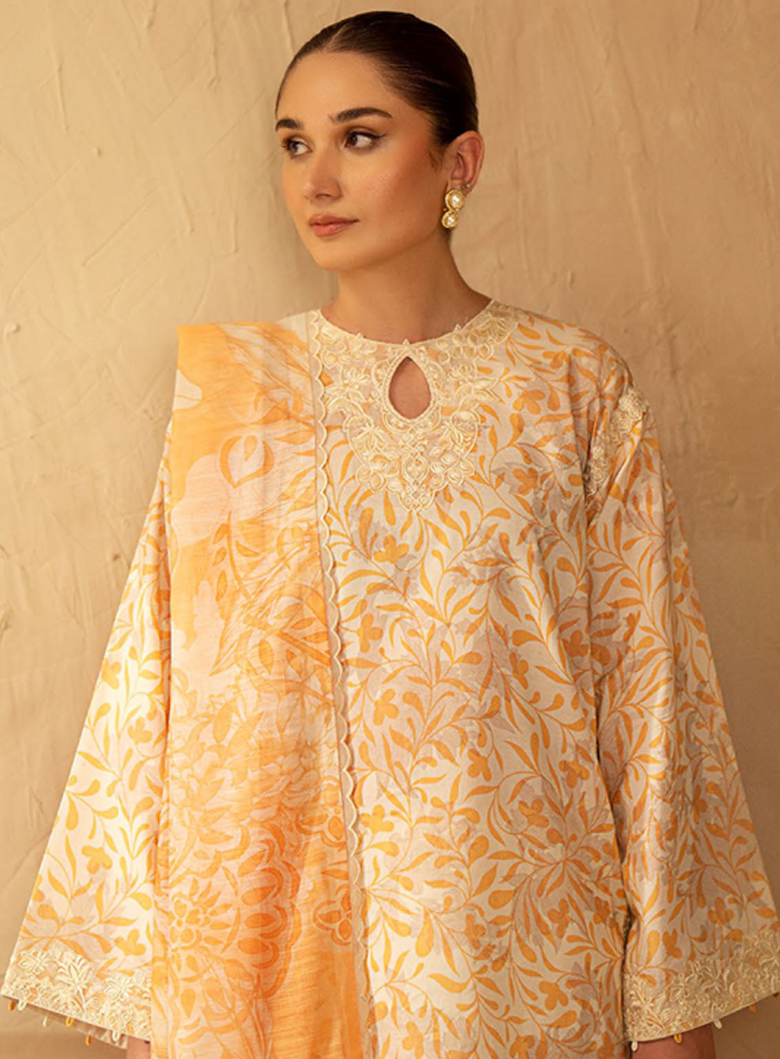 Ilara By Seran Embroidered Cambric 3 Piece Unstitched Suit SRN24I D-10 MIEL Ilara By Seran Embroidered Cambric 3 Piece Unstitched Suit SRN24I D-10 MIEL